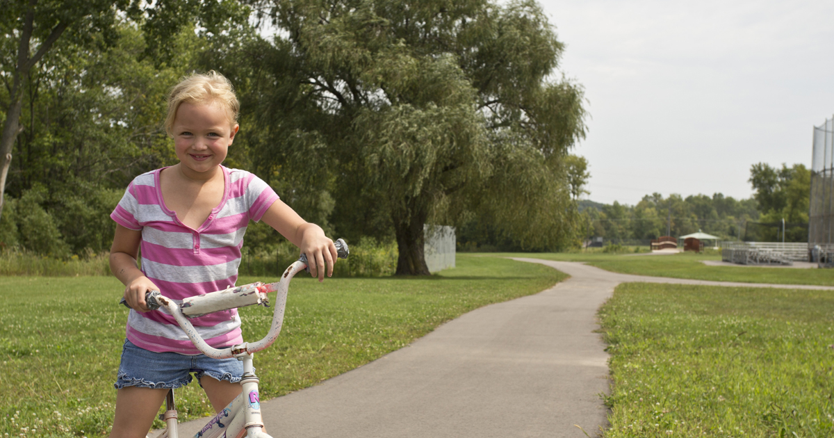 girl on bike path