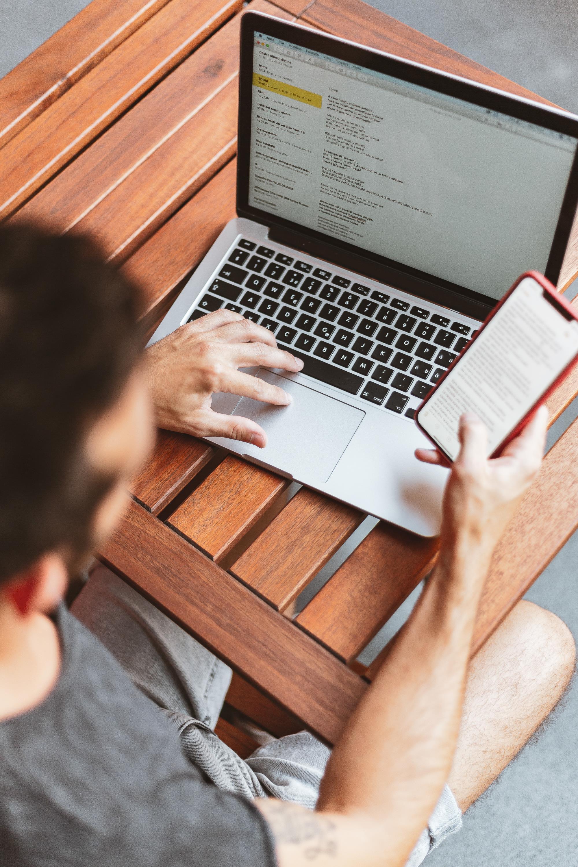 Man checking email on a laptop