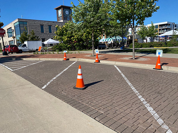 Parking spots at Drexel Town Square marked for handicap parking at the Farmers Market.