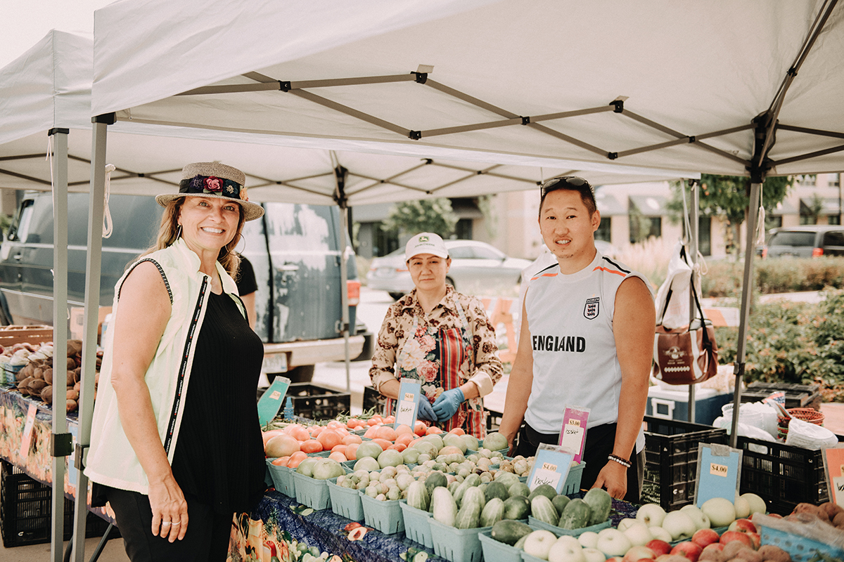 Farmers Market Manager speaking with Vendor